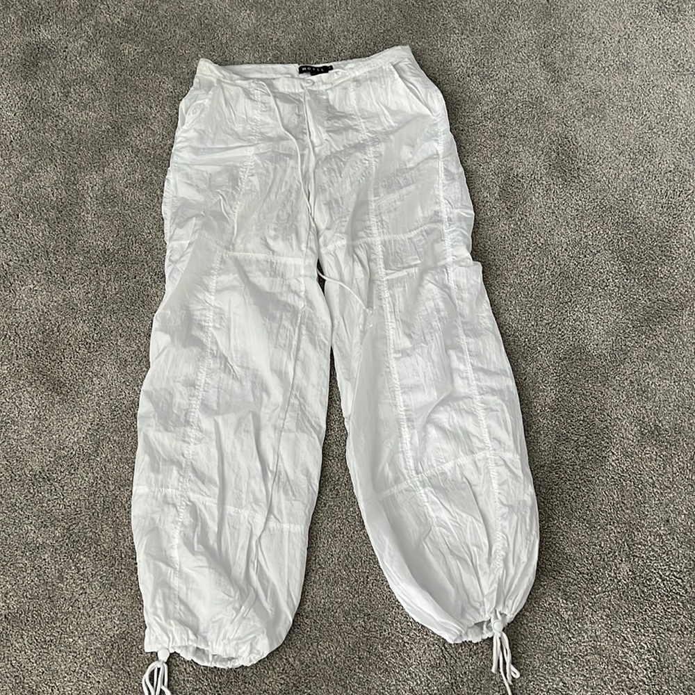 White parachute pants from Motel Rocks